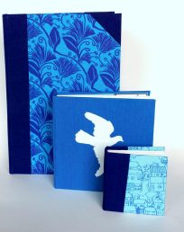 assorted sketchbooks in blue