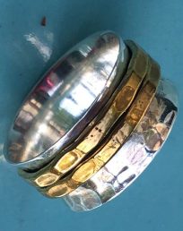 Spinning Ring - hammered silver and brass