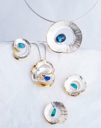 Selection of Sculptural Swirl Pendants with Gemstones