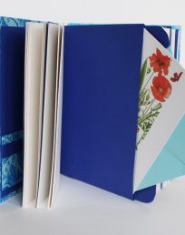 Memory book with envelopes and pockets